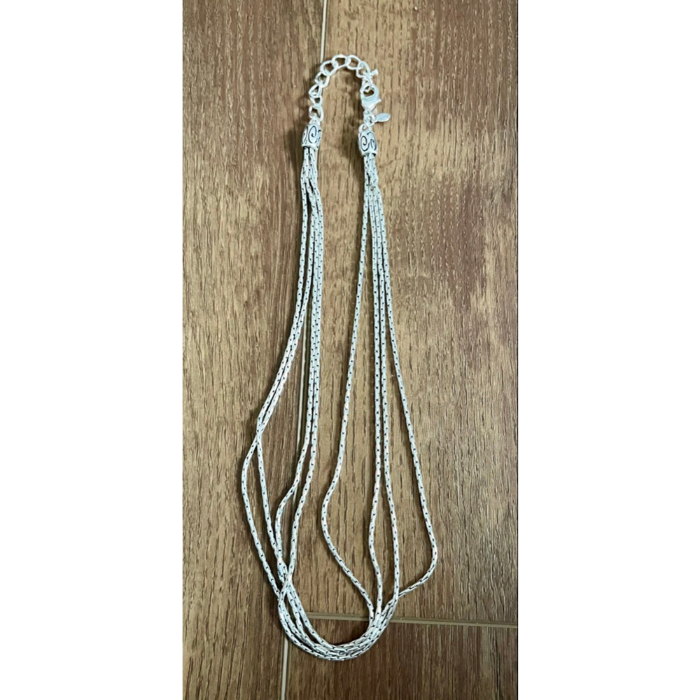 Multi strand silver tone necklace